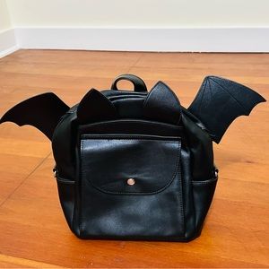 Royal monk bat backpack crossbody bag